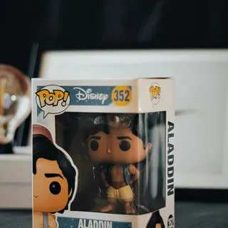A boxed Funko Pop Aladdin vinyl figure