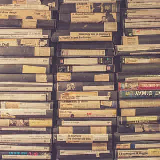 Stacks of French-language VHS tapes